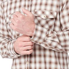 When it comes to western shirts, the Valley or "El Valle" has been well-tested for long-lasting comfort and quality. Named after the Rio Grande Valley, this long-sleeve western comes with all the tried-and-true details, including two flap pockets and a western front and back yoke. In the field or at the table, the Valley runs deep with tradition and function. Model is 6'1 and wearing size M. Classic Shirt For Rodeo In Fall, Classic Fall Shirt For Rodeo, Western Shirt With Pockets For Ranch, Fitted Long Sleeve Shirt For Western-themed Events, Western Style Shirt With Button Closure For Fall, Western Brown Shirt For Ranch, Brown Western Shirt For Ranch, Western Style Brown Shirt For Ranch, Western Fall Flannel Shirt With Button Closure