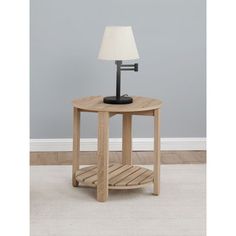 a wooden table with a lamp on top