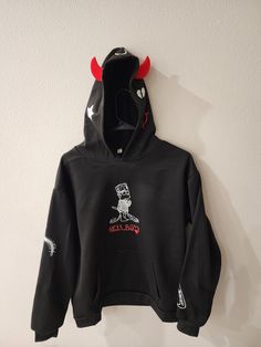 Lil Peep - Hellboy devil horn hoodie  Custom made by me with HTV on a poly-cotton blended fabric hoodie  Sizes S-XXL available. It does run a tad on the smaller side, so please keep this in mind when placing your order. I highly recommend sizing up 🙂*  Care instructions: Machine Wash Cold, Tumble Dry (inside out) on low setting  This product does typically take me a little longer to make, so please allow at least 10 business days from date of purchase for it to ship out🙏 Feel free to check out Alternative Cotton Hoodie With Crew Neck, Alternative Cotton Crew Neck Hoodie, Cotton Crew Neck Alternative Hoodie, Black Fleece Hoodie For Halloween, Black Fleece Halloween Hoodie, Halloween Urban Cotton Hoodie, Urban Cotton Hoodie For Halloween, Casual Hooded Hoodie For Fan Merchandise, Cotton Sweatshirt With Drawstring Hood For Fans