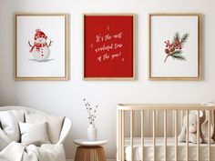 a baby's room with three framed pictures on the wall