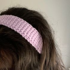 a close up of a person wearing a headband