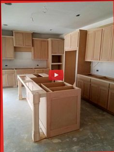 an unfinished kitchen with wooden cabinets in the process of remodeling