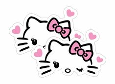 two hello kitty stickers sitting next to each other on a white surface with hearts