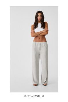 Long flowing trousers in a viscose and linen blend. Adjustable elasticated waistband with matching drawstrings. Side pockets. Straight wide-leg design. Available in several colours. Linen Women, Linen Blend, Wide Leg, Trousers