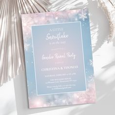 a pink and blue snowflake themed party card