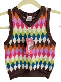 gymboree mix and match argyle sweater vest top NWT cotton sz 4. Pet friendly and smoke free home. Please contact me with any questions! Multicolor Cotton Sweater Vest For Winter, Fitted Cotton Y2k Sweater, Trendy Cotton Vest For Fall, Casual Argyle Pattern Vest For Fall, Casual Cotton Sweater With Argyle Pattern, Trendy Cotton Sweater Vest For Fall, Fitted Multicolor Knit Vest, Casual Cotton Argyle Sweater, Trendy Argyle Pattern Tops For Fall