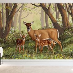 a painting of two deer and their baby in the woods