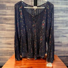 Nwt. Bell Sleeve Peasant Blouse. Size Xl. Navy Blue With Multicolored Pattern. Lace Detailing On Front And Sleeves. Blue Tunic Tops For Fall, Fall Boho Print Peasant Tunic Top, Flowy Long Sleeve Rayon Peasant Top, Patterned Long Sleeve Peasant Blouse, Fall Rayon Peasant Top, Blue Boho Print Top For Fall, Blue Boho Print Tops For Fall, Fall Peasant Tops In Rayon, Fall Peasant Style Rayon Tops