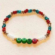 Handmade Stretchy Adjustable Christmas Color Beaded Bracelet With Letter Beads Spelling Out The Word "Kiss" Bracelet With Letter Beads, Christmas Kiss, Preppy Bracelets, Word Bracelet, Christmas Color, Letter Beads, Christmas Colors, Womens Jewelry Bracelets, Beaded Bracelet