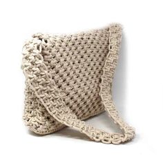 a crocheted purse is shown on a white background, with the strap down