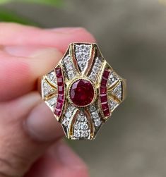 Please read every details carefully - This ring is second-hand from pawn shop. Beautiful Natural Mozambique Ruby and Natural diamonds on 17.3k (72%) gold Ring (Certified) A stunning antique estate ring with exceptional color of ruby and Natural White Diamonds on the 72 percentage of gold (17.3 Karat) ring  -Second-hand- I think it's from around 20 years ago but I am not sure of the precise date. The ring was made by hand (You can see the overall details of the ring - it's a little imperfection so we can know this piece was done by handmade jeweler) - it's very nice details. I got this ring from pawn shop in Thailand. It's very stunning. this ring is in very good condition - I have re-polished/clean the ring, checked the diamonds, ruby and gold already. (This ring had been certified) Please Art Deco Gia Certified Collectible Rings, Collectible Art Deco Gia Certified Rings, Art Deco Diamond Ring With 17 Jewels, Art Deco Diamond Rings With 17 Jewels, Art Deco Diamond Cluster Ring With 17 Jewels, Fine Jewelry Gold Ruby Ring Gia Certified, Art Deco Diamond Ring With Gemstone, Gia Certified 14k Gold Ruby Ring, Art Deco Jewelry With Center Stone