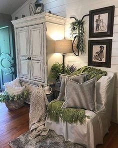 an instagramted photo of a bedroom with white furniture and green accents on the walls