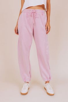 Get ready to sprint to the finish in these pink, fleece-lined sweatpants! With cozy pockets, a smocked waistband, and a drawstring, these relaxed, wide-legged pants are perfect for any activity. The cinched bottom hemlines and ankle length add a touch of style to these comfortable yet fashionable pants. Run in style with FREE PEOPLE - Sprint To The Finish Pants! Details FREE PEOPLE pink sweatpants Fleece lined interior Front pockets Smocked waistband + drawstring Relaxed, wide-legged fit Cinched Nursing Friendly Tops, Free People Sandals, Nursing Friendly Dress, Plus Swim, Plus Jumpsuit, Pink Sweatpants, Pink Fleece, Pants Details, Exclusive Dress