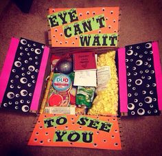 an open box filled with candy and candies that says, eye can't wait to see you