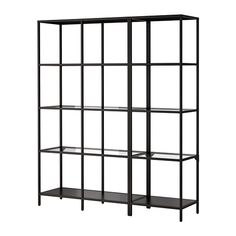 a black bookcase with four shelves on each side and one shelf in the middle