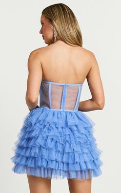 Amalie The Label - Meredith Strapless Tulle Tiered Bustier Mini Dress in Blue Blue Strapless Ruffled Dress For Prom, Blue Strapless Ruffle Dress For Prom, Blue Strapless Dress With Ruffles For Prom, Blue Tulle Dress With Boned Bodice, Blue Tulle Dress With Lined Bodice, Blue Summer Corset Dress With Boned Bodice, Blue Corset Dress With Boned Bodice For Prom Season, Fitted Blue Tulle Corset Dress, Blue Ruffled Corset Dress For Party