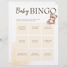 a baby shower game with a teddy bear on the top and words written in brown