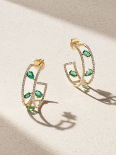 House Of Meraki founder Gargi Rathi is fuelled by a lifelong love of emeralds - the Zambian ones adorning these 'Tamara' earrings are valued for their particularly rich depth of color. Handmade from 18-karat gold, they're set with sparkling diamonds to outline the hoops. Style yours for day or night. Luxury Gold Gemstone Earrings, Luxury Gold Emerald Diamond Earrings, Luxury Green Hoop Jewelry, Fine Jewelry Emerald Hoop Earrings, Green Diamond Hoop Earrings Fine Jewelry, Luxury Green Hoop Earrings, Luxury Green Diamond Hoop Earrings, Green And Gold Jewelry, Luxury Emerald Hoop Earrings