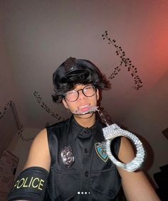 a police officer with fake mustache and handcuffs