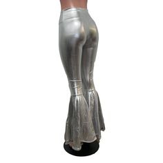 "**Due to SO MANY issues with USPS - we STRONGLY ENCOURAGE you to purchase the UPS Upgrade with your order located here: https://www.etsy.com/listing/926751536/ups-upgrade Made of shiny silver metallic spandex - these high-waisted bell bottoms will fit you perfectly. They hug your hips and flare out at the feet. The standard inseam is 34\" (the mannequin is 5'8\") but can be customized by putting your desired inseam in the comments/notes when checking out. Women's Sizing (See below for instructi Full Length Disco Bottoms For Summer, Retro Bottoms For Night Out In Spring, Retro Full Length Party Bottoms, Retro Bottoms For Spring Night Out, Retro Spring Bottoms For Night Out, Vintage High Waist Party Bottoms, Metallic Flare Bottoms For Night Out, Vintage High Waist Pants For Party, Metallic Disco Bottoms For Spring