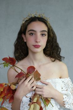 Boho brides, Ethereal brides, cool stylish modern brides...This could be the one for you! Style it with pre-Raphaelite curls for a goddess vibe if you are having a rustic forest wedding, or combine it with a messy up-do and a cutting-edge contemporary dress for partying hard at your city wedding. A gorgeous, professionally hand-made tiara that's easy and comfortable to wear. It is available only in gold. It features faux pearls, which is perfect if you are wearing other pearl jewelry, but if you Crown With Pearls, Silver Wedding Headpiece, Goddess Bride, Rustic Forest Wedding, Ethereal Bride, Short Bridal Hair, Star Crown, Crown Headpiece, Contemporary Bridal