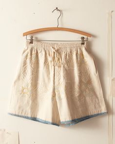 Crochet Ladderwork Shorts – BODE Cottagecore Cotton Bottoms For Summer, Cotton Cottagecore Bottoms For Summer, Bohemian Embroidered Cotton Shorts, Vintage Cotton Shorts For The Beach, White Cotton Cottagecore Bottoms, Vintage Cotton Shorts With Elastic Waistband, Embroidered Cotton Beach Shorts, Beach Embroidered Cotton Shorts, Floral Embroidery Cotton Shorts