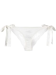 Find GILDA & PEARL Grace Lace Panel Knickers on Editorialist. Ivory Grace lace panel knickers from Gilda & Pearl featuring side tie fastenings, a low rise and a sheer panel. POSITIVELY CONSCIOUS: Gilda & Pearl scores 3 out 5 by independent ethical brand rating agency Good On You. It has a good animal rating and does not use fur, leather, wool, down, exotic animal skin or angora. It traces most of its supply chain manufacturers locally to reduce its carbon footprint. Grace And Lace, Getting Ready Wedding, Pearl Gifts, Pajamas Gift, Ethical Brands, Miss Dior, Designer Lingerie, Animal Skin, Bridal Lingerie