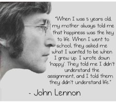 john lennon quote on the screen in front of a television monitor with an image of him