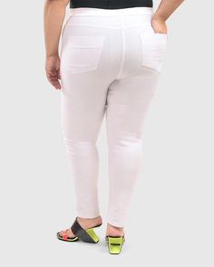 Why perfect? It's all about the flattering fit and the amazing comfort—and everyone needs a pair of white jeans for Summer! The all-around stretch waist has a wider band for a smooth, flat front. The leg is perfectly tapered to hug your curves from hip to hem. Detailed with mock fly, angled side pockets, yoked back and patch pockets. PLUS CAPSULE: 1X,2X,3X for a roomier fit throughout Cathy is 5'9" & wears 1X (16-18) 72% viscose + 23% nylon + 5% elastane Machine wash, tumble dry low Designed & m White Stretch High Rise Jeggings, White Stretch High-rise Jeggings, White Fitted Casual Jeggings, White Casual Jeggings For Spring, White Stretch Mid-rise Jeans, White 4-way Stretch Straight Leg Bottoms, White Elastane Pants With 4-way Stretch, White 4-way Stretch Pants For Spring, White Fitted Mid-rise Jeggings