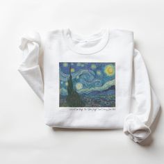 Vincent van Gogh celebrates his 170th birthday this year. Why not pay homage to the great artist with our Starry Night Crewneck Sweatshirt. If you love beautiful art, and you like to incorporate beautiful pieces into your wardrobe to appreciate every day, you'll love this sweater.  Also available in a T-Shirt Here: https://www.etsy.com/listing/1450765121/classic-art-t-shirt-stary-night-tshirt?click_key=18296c95de95ffc6659928f83b29fa3702796455%3A1450765121&click_sum=dc14cabf&ref=shop_home_active_1 These garments are made from polyester and cotton. This combination helps designs come out looking fresh and beautiful. The collar is ribbed knit, so it retains its shape even after washing. There are no itchy side seams on these sweaters.  .: 50% cotton, 50% polyester .: Medium-heavy fabric (8.0 Starry Night Sweater, Mountain Biker Gifts, Vincent Van Gogh Starry Night, Bulldog Tshirt, Outfit Pieces, Unique Sweatshirt, Biker Gifts, Bike Shirts, Starry Night Van Gogh