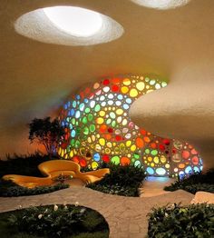 the interior of a building with colorful circles on it