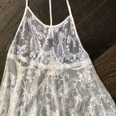 Nwt Beautiful White Lace Racerback Coverup Size S But Would Fit A M No Trades Comment With Questions White T-back Top With Built-in Bra, White T-back Tops For Summer, White Racerback Camisole For Summer, Summer Backless Camisole With Lace Trim, Fitted Summer Camisole With Lace Back, Fitted Lace Back Camisole For Summer, Fitted Lace-back Camisole For Summer, White Racerback Camisole For Spring, Spring T-back Top With Built-in Bra