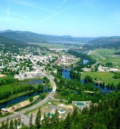 an aerial view of a town and river