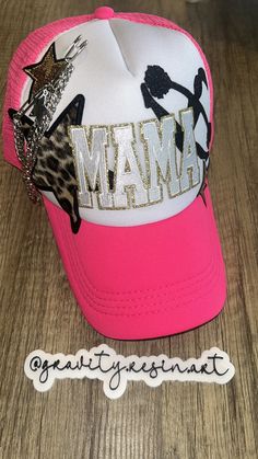 Show your support in style with our custom cheer mama hat! Perfect for proud cheerleading parents, this hat features a unique design that can be personalized to reflect your cheer squad's colors or your child's name. Made from high-quality materials, it offers comfort and durability, making it ideal for game days or practice sessions. Whether you're in the stands or on the sidelines, this hat is a fantastic way to cheer on your little athlete while looking fabulous! Personalized Pink Snapback Trucker Hat, Fun Personalized Pink Trucker Hat, Personalized Pink Trucker Hat, Customizable Pink Baseball Cap, Trendy Customizable Pink Baseball Cap, Customizable Pink Trucker Baseball Cap, Adjustable Pink Trucker Hat For Sports Events, Adjustable Pink Baseball Cap, Pink Adjustable Trucker Hat For Sports Events