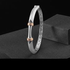 Platinum Kada, Bangles & Bracelets by Jewelove Men of Platinum Culminating in a magnificently curved dual-tone center and with a netted inner silhouette, this bracelet honors the power of your quiet fortitude. It lets you take the shape of any vessel that you are put in, without compromising on your inner mettle. Crafted in enduring platinum, to mirror your sheer resilience. Crafted in combination of Platinum & Rose Gold. The K is made in 95% Platinum & 18K Gold, hallmarked Pt 950 for platinum p Chandi Kada For Men, Trendy Silver Jewelry, Gents Bracelet, Kada Bangles, Platinum Jewellery, Platinum Bracelet, Diamond Bracelet Design, Diamond Jewelry Set, Diamond Pendent