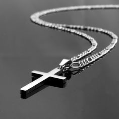 "*Christian cross necklace is Highly polished shiny both sides surface simple and classic design pendant with high quality 3mm Figaro Link chain. *Men's Cross Necklace, cross pendant with chain High Quality 316L Stainless Steel is Commonly used for jewelry because it will not oxidize or turn black with only minimal maintenance. *Cross Pendant size : Length - 1.26\"(32mm), Width - 0.7\"(17mm), Cross Chain size : Length - 18\" - 24\", Width - 3mm. Four different lengths provided for you option, Se Elegant Stainless Steel Necklace For Father's Day, Spiritual Stainless Steel Cross Pendant Necklaces, Classic Engraved Crucifix Necklace, Engraved Stainless Steel Cross Necklaces, Father's Day Stainless Steel Cross Pendant Necklace, Classic Silver Crucifix Necklace, Spiritual Stainless Steel Necklaces For Father's Day, Spiritual Stainless Steel Necklace For Father's Day, Engraved Stainless Steel Cross Pendant Necklace