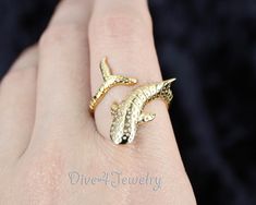 "Solid 925 Sterling Silver Gold Pleated Whale shark wrap ring Ring size: Fully adjustable to perfectly fit. (will fit approximately US sizes 5 to size 10) Weight: approx: 4.7 grams Metal type: Solid 925 STERLING SILVER with Gold Plated Finish Item Stamped \"925\" for Sterling Silver Ring size conversion link: http://www.onlineconversion.com/ring_size.htm (c I designed and we created this item. Owned by Dive4Jewelry** **Follow me on facebook for special announcements, Coupon codes and sales: www. Shark Rings Jewelry, Fish Rings Jewelry, Whale Tail Ring, Whale Ring Silver, Shark Tooth Ring, Ocean-inspired Shell-shaped Rings As Gift, Shark Ring, Enso Rings, Whale Shark