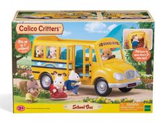 a yellow school bus with two animals in it