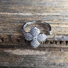 a close up of a ring on a wooden surface