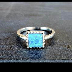 Brand New Handmade Opal Silver Ring. Size 6.25 925 Stamped New To Poshmark? Use Referral Code Kimberlyn222 To Receive $10. Formal Sterling Silver Opal Ring, Blue Sterling Silver Opal Promise Ring, Formal Silver Opal Birthstone Ring, Formal Opal Ring Stamped 925, Classic Blue Opal Ring As A Gift, Silver Opal Ring With Halo Setting For Formal Occasions, Elegant Blue Opal Ring Stamped 925, Formal Silver Opal Ring With Halo Setting, Blue Opal Ring Stamped 925 For Gift