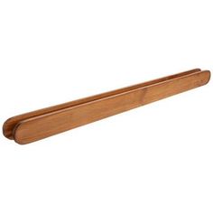 a wooden shelf that is on the wall and has a handle for it to hold something