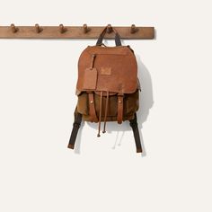 Built to travel with you everyday, with tons of space and a padded back, our rugged Lennon Backpack is comfortable and sturdy enough to tag along no matter where you are headed. Equally as suited for the office as it is for the trail. Constructed from full grain vegetable tanned leather and 18 oz 100% cotton canvas the bag is built to last and will only get better with age. Dimensions: 12” x 16” x 8.5” Weight: Approx. 4 lbs Full-grain vegetable-tanned leather & 18 oz. cotton canvas Interior lapt Luxury Waxed Canvas Backpack For Everyday Use, Classic Backpack With Waxed Finish, Luxury Waxed Finish Backpack For Daily Use, Luxury Waxed Canvas Backpack With Waxed Finish, Luxury Waxed Finish Backpack, Luxury Waxed Canvas Backpack, Outdoor Leather-backed Backpack, Travel Leather-trim Coated Canvas Backpack, Rugged Leather-backed Backpack For Adventure