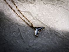 Welcome to Resina. I'm Ori, and Im making unique handcrafted jewelry from resin. Presenting our exquisite 18K Gold Plated Orca Tail Necklace Necklace, a true one-of-a-kind piece. At Resina, every item is made with meticulous care and dedication. We exclusively use premium, non-toxic, VOC-free, and BPA-free resin materials to ensure the highest quality and safety. 🌟Discover Our Top 3 Best-Sellers and Enjoy 10% Off! Use code TOPRESINA11 at checkout to receive your discount on these handcrafted tr Orca Tail, Whale Tail Jewelry, Ocean Pendant, Coastal Fashion, Dolphin Necklace, Unique Handcrafted Jewelry, Turtle Necklace, Whale Tail, Stainless Steel Plate