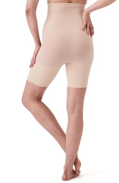 This sculpting shaper is lightweight and powerful with booty-lifting zones, a seamless design and high waist for supportive coverage. Support level: Shape-a firm hug Lined double gusset 55% nylon, 45% elastane Machine wash, dry flat Imported Seamless Compression High-cut Leg Shorts, High-cut Leg Compression Seamless Shorts, Compressive Beige Shapewear With Built-in Shorts, Compressive Beige Shapewear Mid-thigh Length, Beige Compressive Mid-thigh Length Shapewear, Compressive Seamless High-cut Leg Shorts, Compressive High-cut Leg Seamless Shorts, High Stretch Seamless High-cut Leg Shorts, High Stretch Seamless Shorts With High-cut Leg