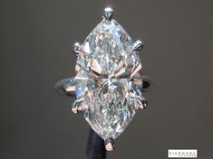 a close up view of a fancy diamond ring