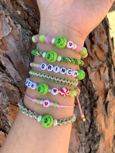 Beautiful Pink Grinch bracelets 😍🥰 Size: 🎄Adult: 6-6.5' (about 10-10.5 inches when fully open)  🎄Kid: 5-5.5' (about 7-7.5 inches when fully open)  Materials: nylon #18, #2, dyed jade beads, black glass pearls, seed beads, acrylic resin Grinch beads, red glass beads, glass green beads, mini jingle bells and 18k gold plated beads. Message me with any questions or different sizing prior to purchase 💕.  Remember that handmade pieces are always unique and they never look exactly the same 🤩 that's why they are so special 😍😉. ️🎁 Follow  me on Instagram  and Facebook for giveaways, special offers and discounts   @roxysshop2021 Grinch Clay Bead Bracelets, Grinch Clay Bead Bracelet, Grinch Heishi Bracelets, Christmas Stretch Bracelets, Grinch Beaded Bracelet, Holiday Bracelets, Christmas Bracelet, Christmas Gift Jewelry, Jade Beads