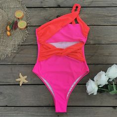 Enhance your swimwear collection with our stylish and eco-friendly One-piece Swimsuit, meticulously designed to combine durability and fashion. Available in a variety of vibrant colors, this swimsuit is perfect for any water activity, ensuring you look chic and feel confident. Features: Premium Polyester Fabric: Made from high-quality polyester fiber, offering excellent durability and a comfortable fit. One-piece Design: The sleek one-piece shape provides a flattering and secure fit, perfect for Pink Beachwear One Piece For Beach Season, Pink Beachwear One-pieces For Beach Season, Pink One Piece Beachwear, Pink Beachwear One-piece, Pink Beachwear One Piece, Summer Beach Color Block Bodysuit, Pink Beachwear Bodysuit For The Beach, Orange Beachwear Bodysuit For Beach, Orange Beachwear Bodysuit For Beach Season