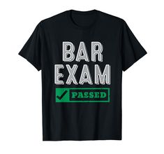 a bar exam t - shirt with the words passed in green and white on it