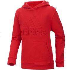 He’ll Fee Great Pre- And Post-Practice In The Adidas Boys’ Exclusive Embossed Logo Hoodie. Cotton-Blend Fleece Offers Warming Comfort, A Crossover Hood Delivers Extra Coverage, And A Front Kangaroo Pocket Holds Small Items. Complete With Embossed Detailing, The Adidas Exclusive Embossed Logo Hoodie Is A Great Addition To His Gear. Features: Regular Fit Hoodie Cotton Blend Fleece Fabrication Crossover Hood Detail Kangaroo Front Pocket Back Neck Taping Embossed Logo Graphic Machine Wash Adidas Red Winter Tops, Red Adidas Tops For Winter, Adidas Red Sweatshirt For Winter, Red Adidas Sweatshirt For Winter, Adidas Red Winter Sweatshirt, Boys Fleece, Red Suit, Sports Hoodies, Adidas Shirt