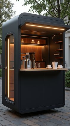 an outdoor bar is lit up with lights on the outside and inside it's doors